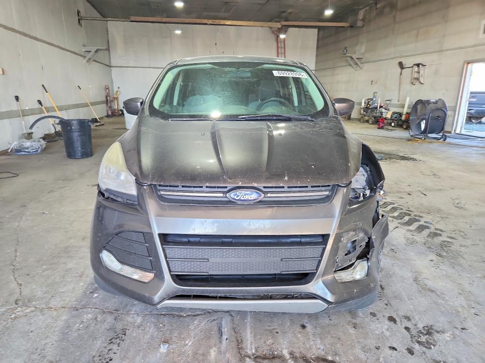 Photo 5 from auction – 2015 FORD ESCAPE with VIN 1FMCU0GX1FUA69796