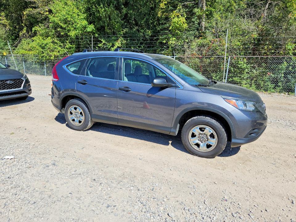 Photo 4 from auction – 2012 HONDA CR-V with VIN 5J6RM4H30CL026161