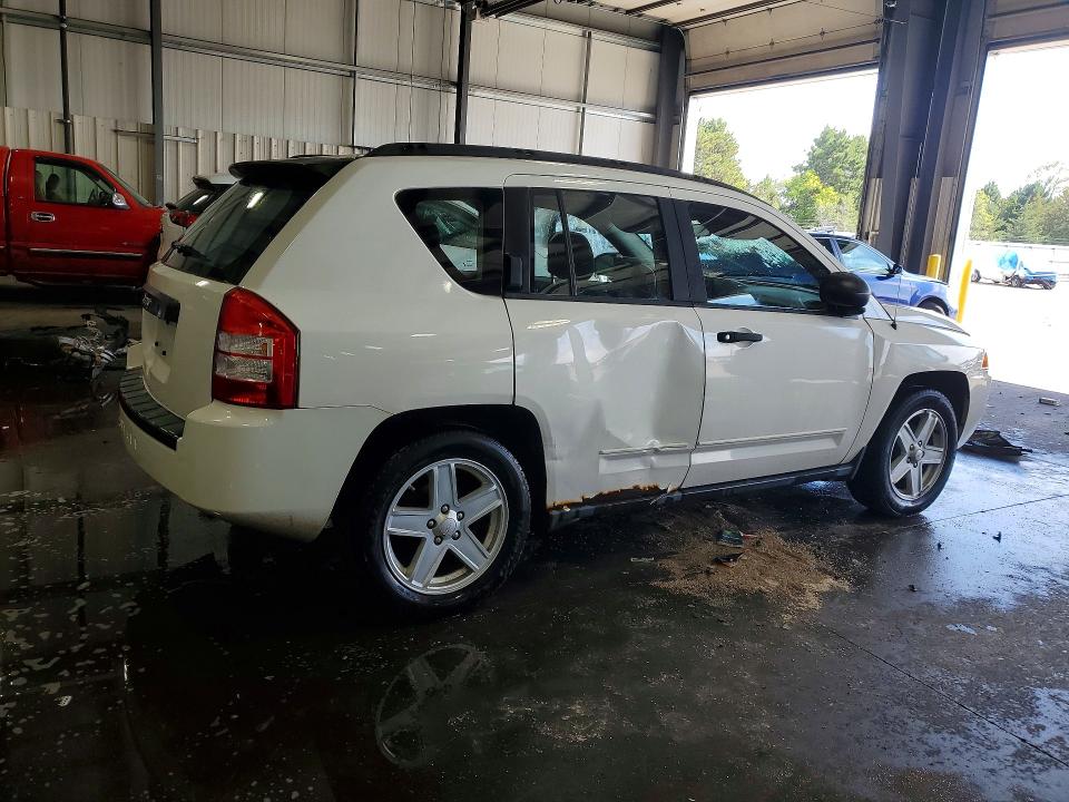 Снимка 3 от търг – 2010 JEEP COMPASS с VIN 1J4NF4FB4AD506021
