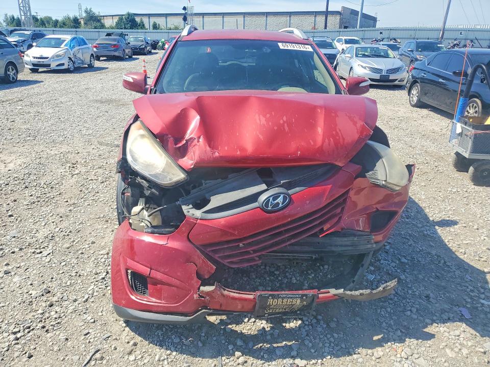 Photo 5 from auction – 2012 HYUNDAI TUCSON with VIN KM8JUCACXCU371405