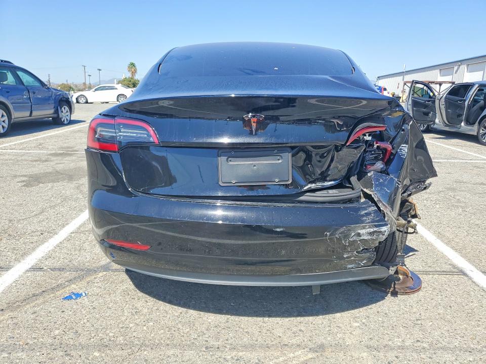 Снимка 6 от търг – 2023 TESLA MODEL 3 с VIN 5YJ3E1EA1PF556951