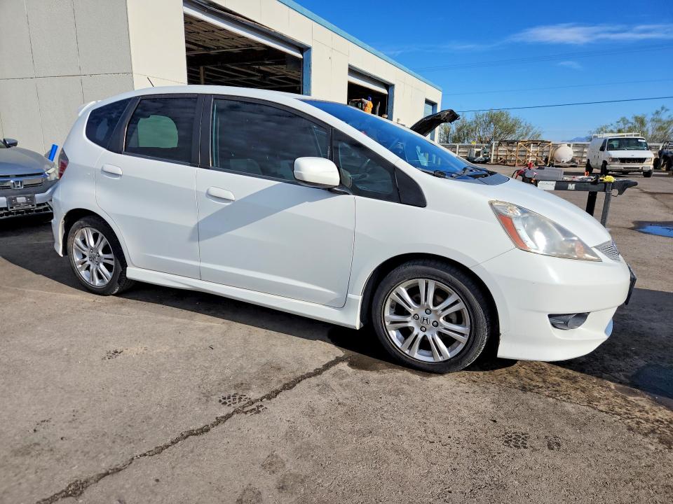 Снимка 4 от търг – 2009 HONDA FIT с VIN JHMGE88679S004568