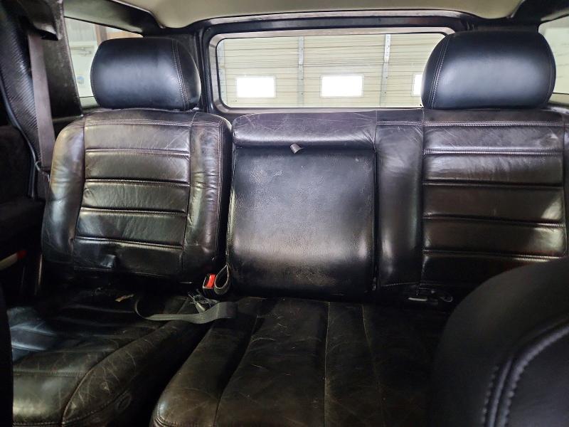 Снимка 10 от търг – 2003 HUMMER H2 с VIN 5GRGN23U93H111998