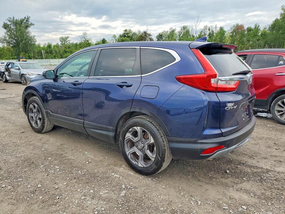 Photo 2 from auction – 2018 HONDA CR-V with VIN 7FARW2H52JE003247
