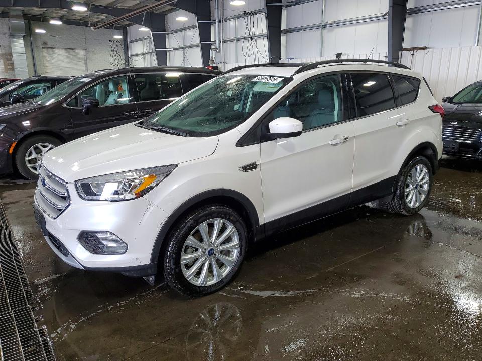 FORD ESCAPE 2019 with VIN 1FMCU9HD3KUB28074 - Photo from auction