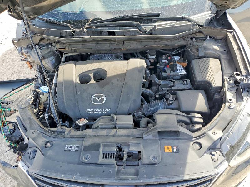 Снимка 12 от търг – 2016 MAZDA CX-5 с VIN JM3KE2BY6G0821355