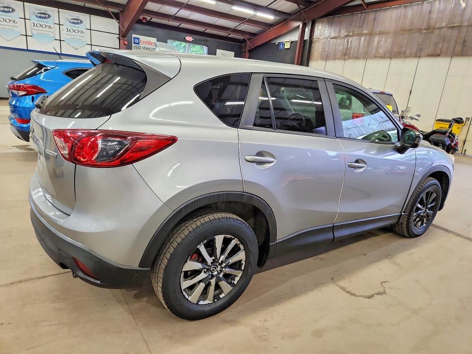 Photo 3 from auction – 2013 MAZDA CX-5 with VIN JM3KE4CEXD0140417
