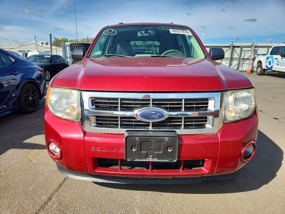 Photo 5 from auction – 2009 FORD ESCAPE with VIN 1FMCU93G19KA16591