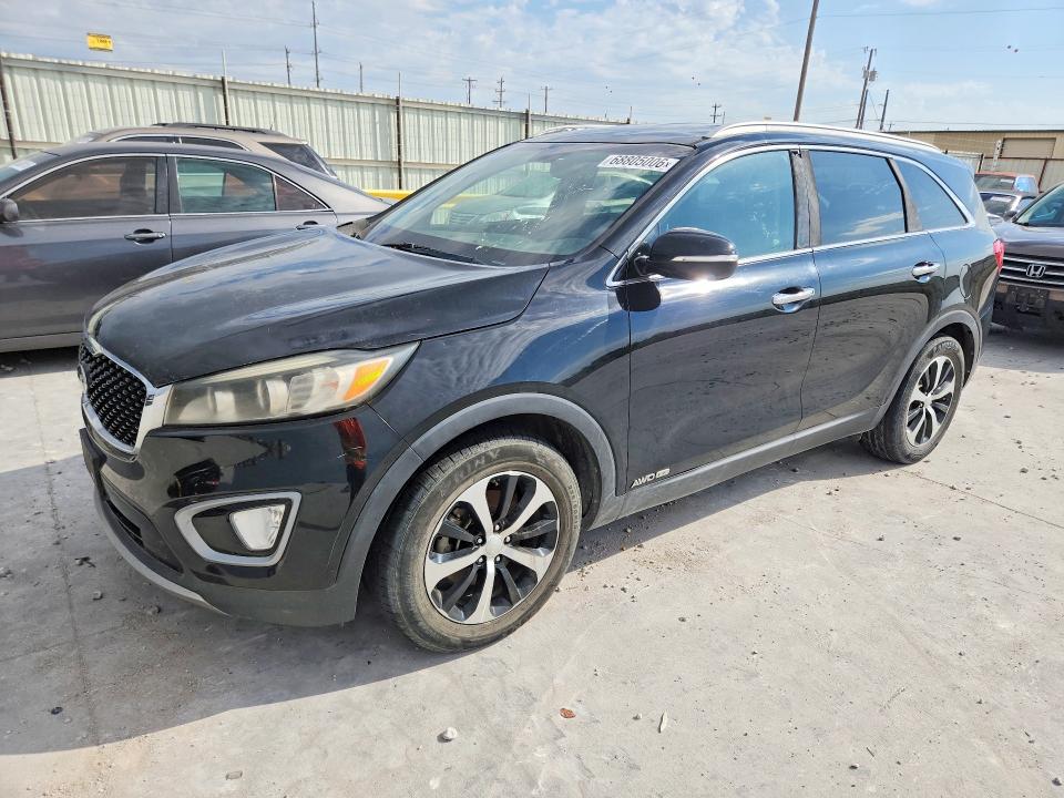 KIA SORENTO 2016 with VIN 5XYPHDA58GG018310 - Photo from auction