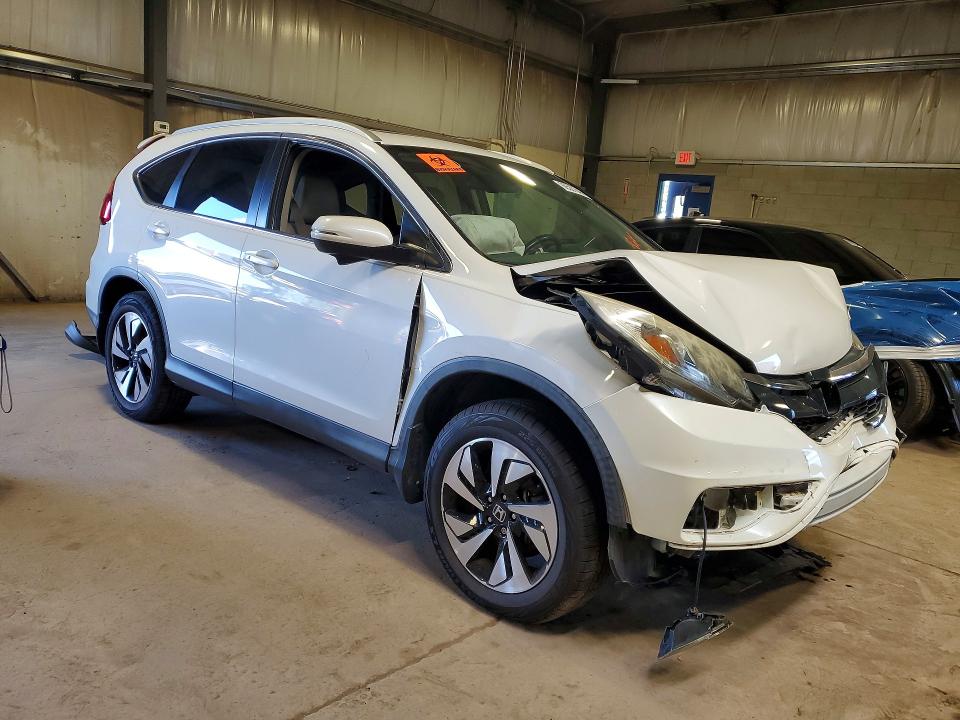 Photo 4 from auction – 2016 HONDA CR-V with VIN 5J6RM4H91GL092728