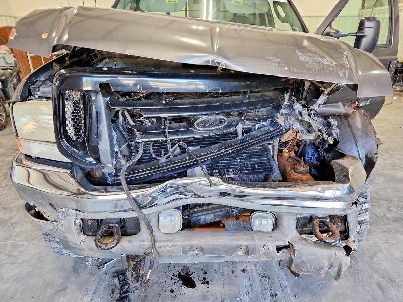 Снимка 11 от търг – 2003 FORD F250 с VIN 1FTNF21L13ED36742