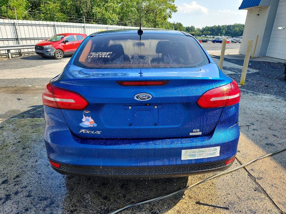 Foto 6 de la subasta – 2018 FORD FOCUS con VIN 1FADP3FE6JL299548