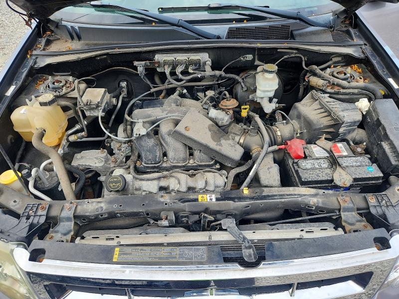 Photo 12 from auction – 2008 FORD ESCAPE with VIN 1FMCU03138KA91850
