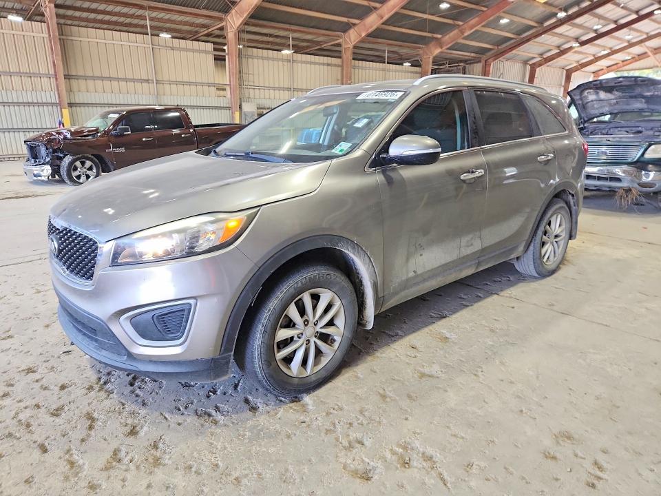 KIA SORENTO 2017 with VIN 5XYPG4A38HG257147 - Photo from auction