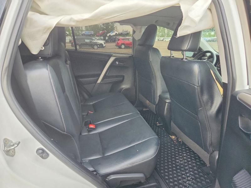 Photo 11 from auction – 2015 TOYOTA RAV4 with VIN 2T3DFREV1FW381032