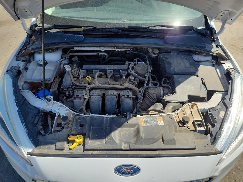 Снимка 11 от търг – 2016 FORD FOCUS с VIN 1FADP3E26GL216099