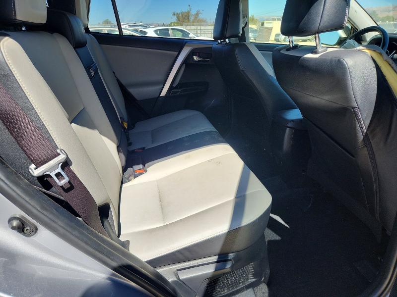 Photo 11 from auction – 2018 TOYOTA RAV4 HV with VIN JTMDJREV2JD171737