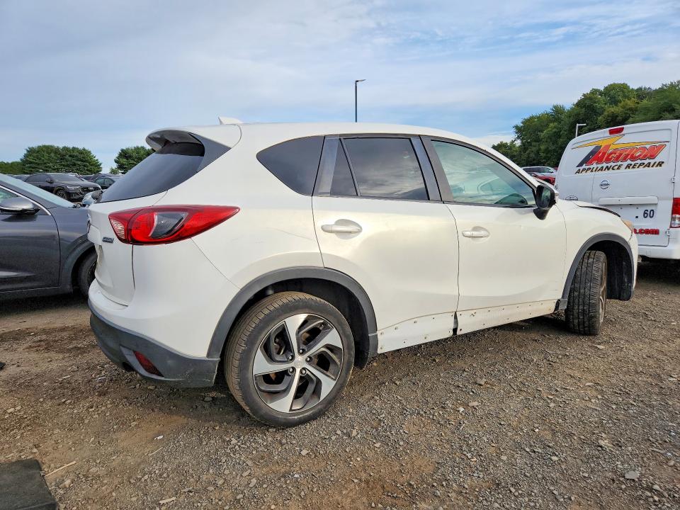 Photo 3 from auction – 2015 MAZDA CX-5 with VIN JM3KE2CY3F0522323
