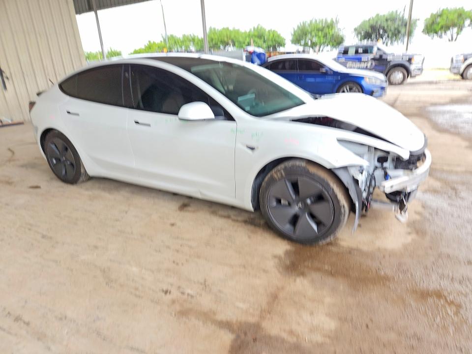 Снимка 4 от търг – 2021 TESLA MODEL 3 с VIN 5YJ3E1EA4MF092095