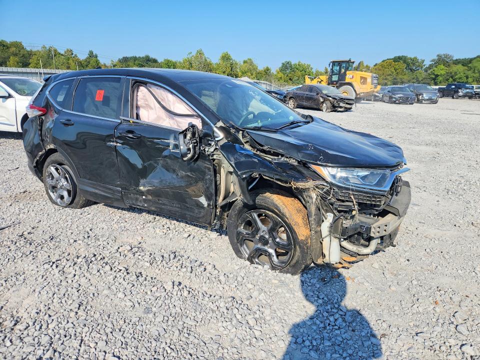 Photo 4 from auction – 2018 HONDA CR-V with VIN 7FARW1H58JE040636