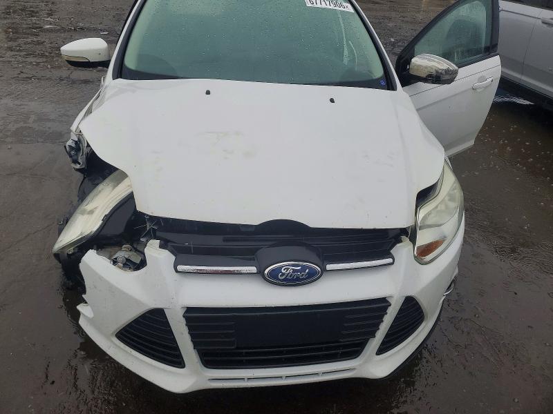 Photo 11 from auction – 2012 FORD FOCUS with VIN 1FAHP3F29CL284018