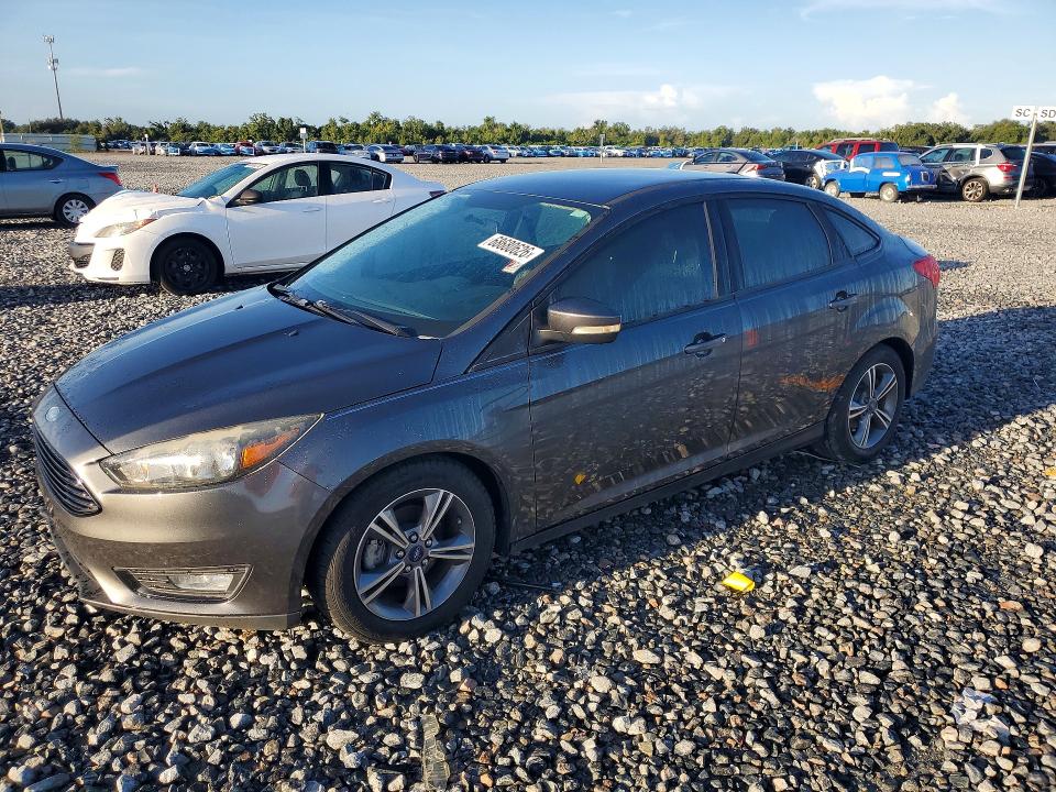 FORD FOCUS 2016 with VIN 1FADP3FE6GL393759 - Photo from auction