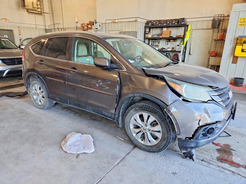Photo 4 from auction – 2014 HONDA CR-V with VIN 2HKRM4H71EH621620