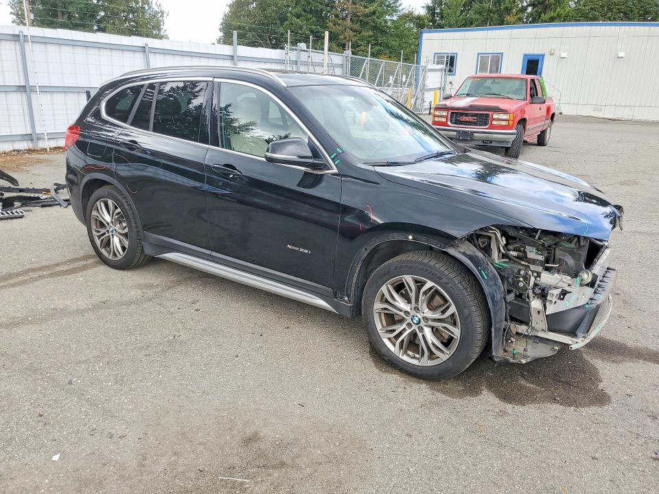 Photo 4 from auction – 2016 BMW X1 with VIN WBXHT3Z32G4A48410