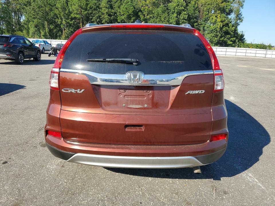 Photo 6 from auction – 2015 HONDA CR-V with VIN 2HKRM4H76FH693737