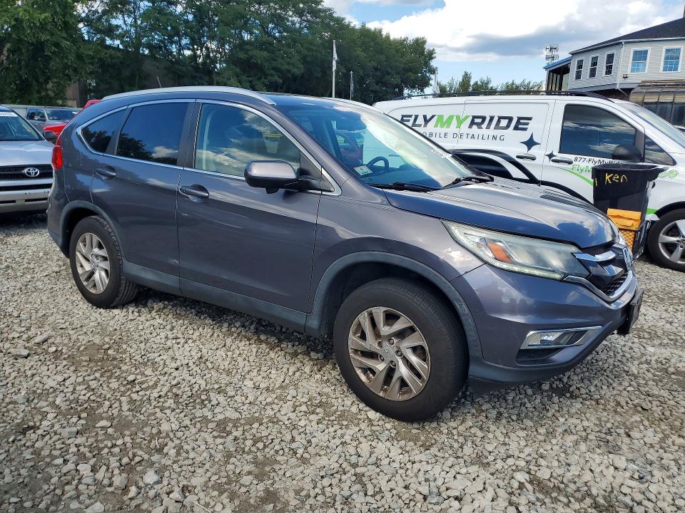 Photo 4 from auction – 2016 HONDA CR-V with VIN 2HKRM4H77GH719067