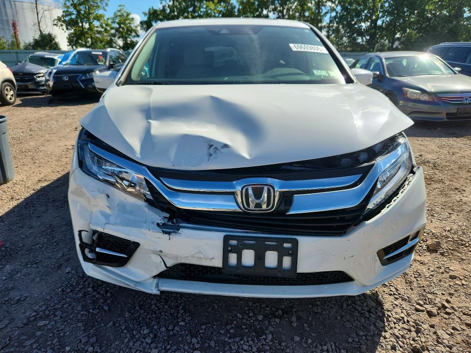 Снимка 5 от търг – 2018 HONDA ODYSSEY с VIN 5FNRL6H99JB046336