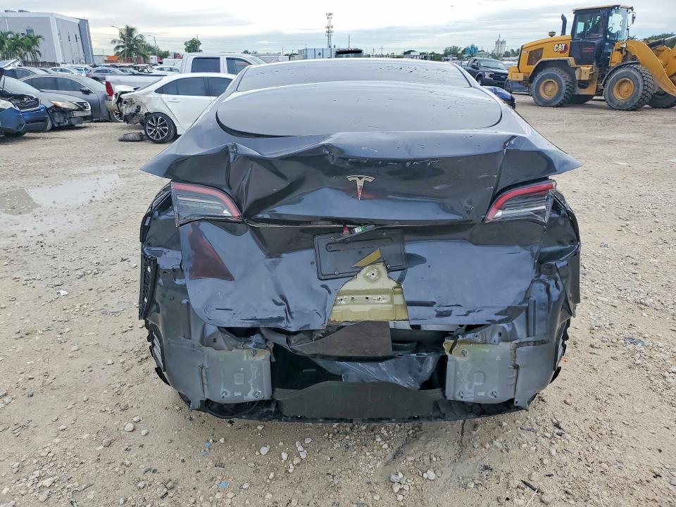 Снимка 6 от търг – 2024 TESLA MODEL Y с VIN 7SAYGDED3RF005048