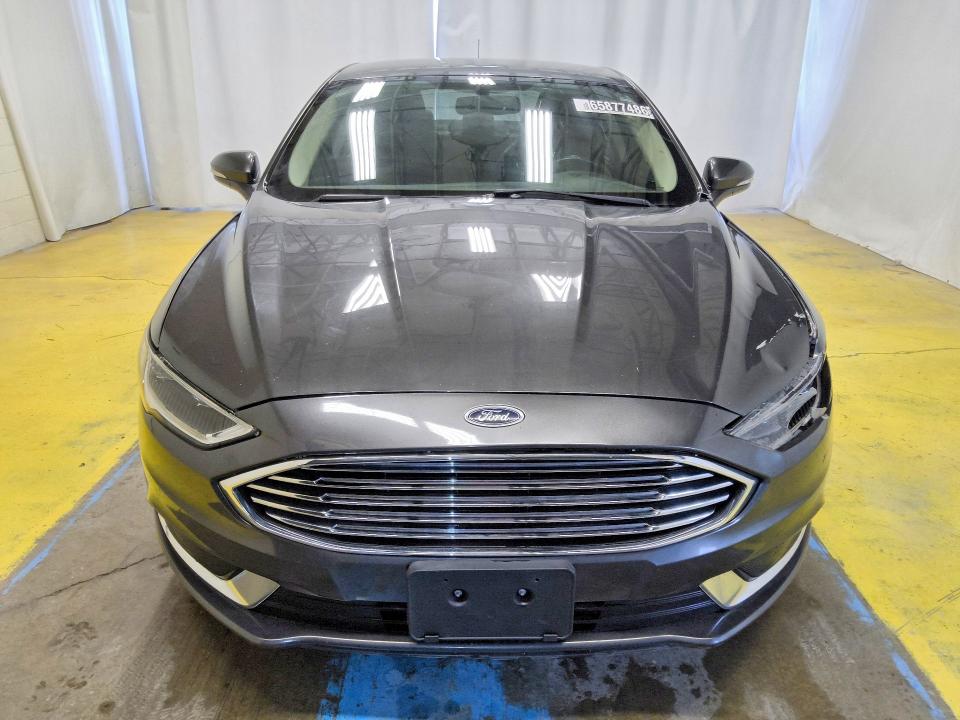Photo 5 from auction – 2018 FORD FUSION with VIN 3FA6P0HD1JR158531
