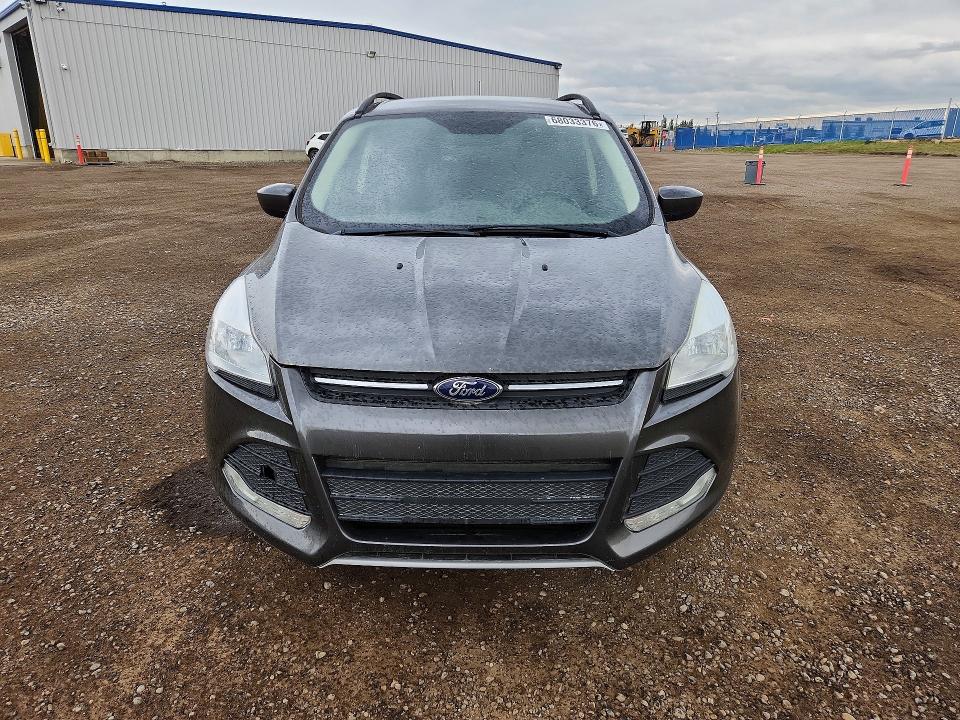Photo 5 from auction – 2015 FORD ESCAPE with VIN 1FMCU9GX5FUC50680
