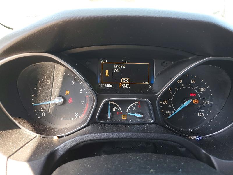 Снимка 9 от търг – 2015 FORD FOCUS с VIN 1FADP3F26FL329208