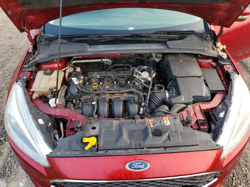 Foto 11 de la subasta – 2016 FORD FOCUS con VIN 1FADP3F26GL351663