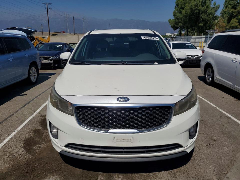 Photo 5 from auction – 2015 KIA SEDONA with VIN KNDMC5C10F6045133