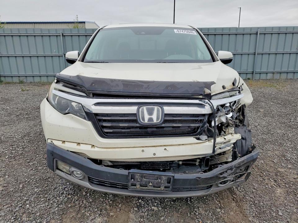 Снимка 5 от търг – 2017 HONDA RIDGELINE с VIN 5FPYK3F77HB503709