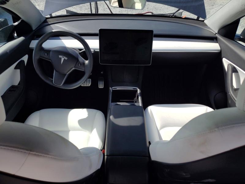 Photo 8 from auction – 2022 TESLA MODEL Y with VIN 7SAYGDEF1NF505012