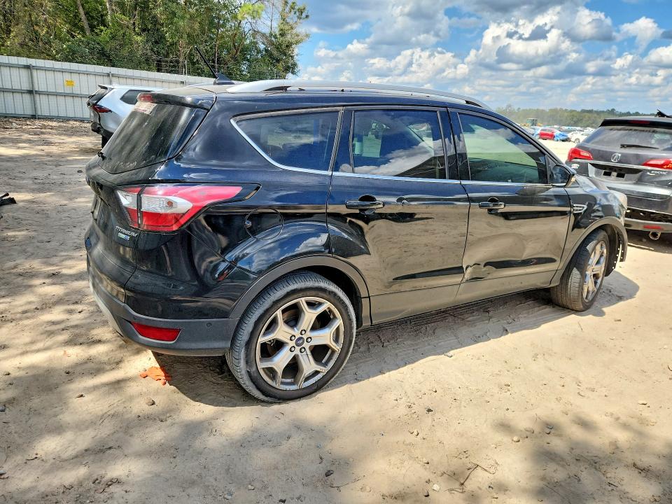 Снимка 3 от търг – 2018 FORD ESCAPE с VIN 1FMCU9J96JUA89338