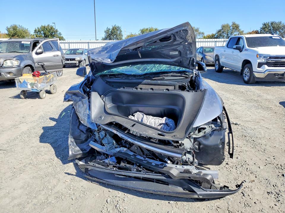 Photo 5 from auction – 2026 TESLA MODEL Y with VIN 7SAYGDET1TA728974