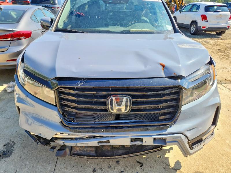 Photo 11 from auction – 2024 HONDA RIDGELINE with VIN 5FPYK3F52RB013338