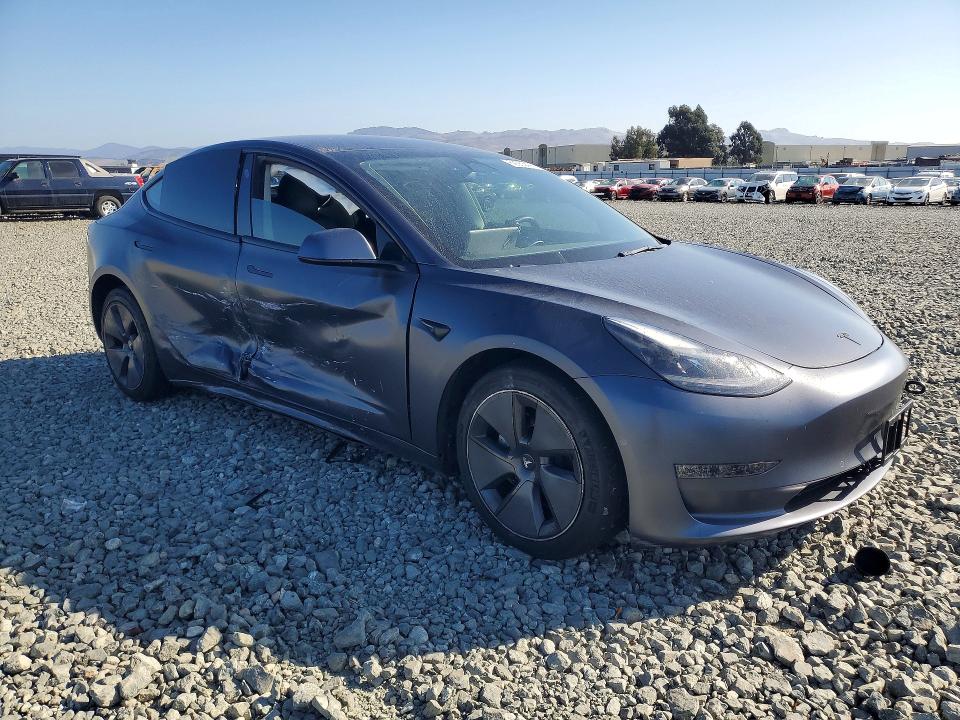 Снимка 4 от търг – 2022 TESLA MODEL 3 с VIN 5YJ3E1EB8NF159971