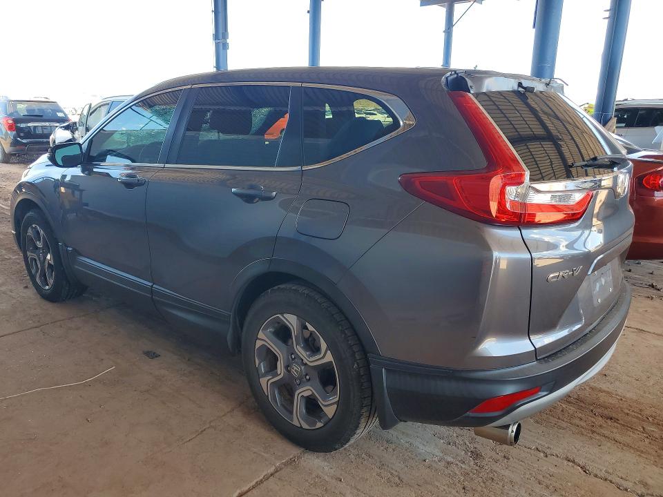 Photo 2 from auction – 2018 HONDA CR-V with VIN 7FARW1H54JE017998