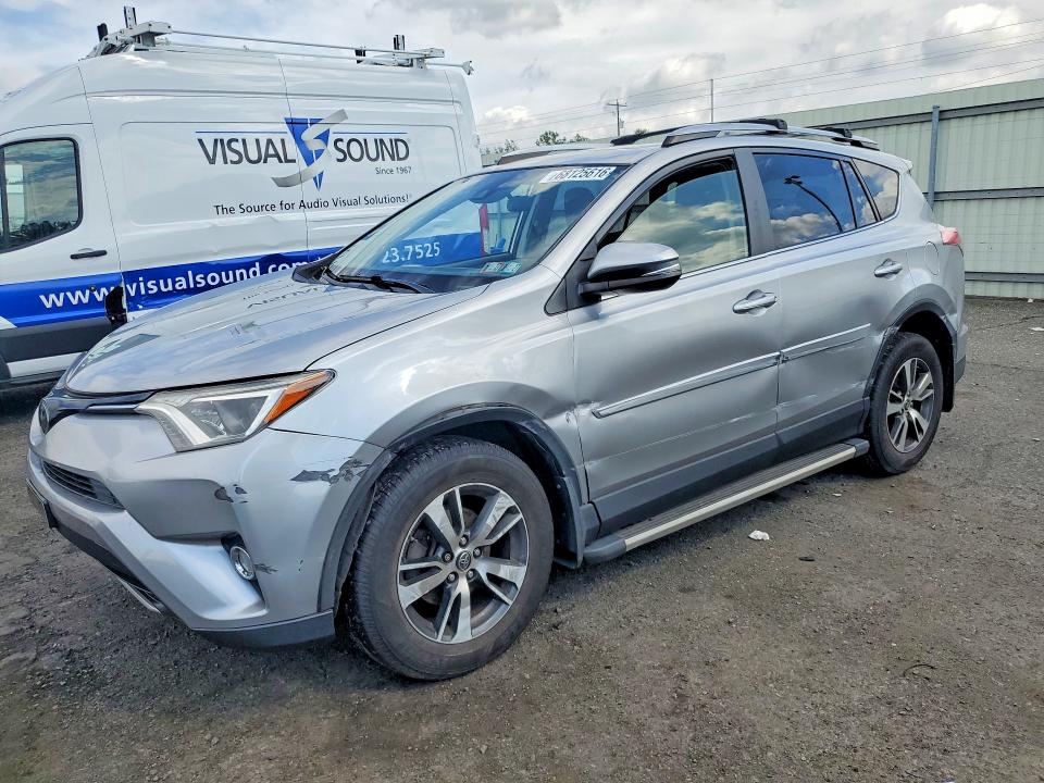 TOYOTA RAV4 2018 with VIN JTMRFREV6JJ221211 - Photo from auction