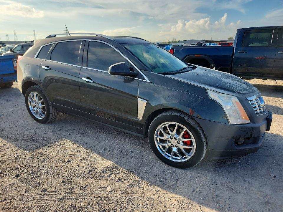 Photo 4 from auction – 2014 CADILLAC SRX with VIN 3GYFNCE34ES627312