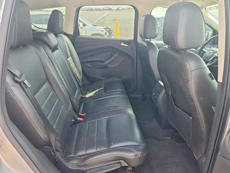 Снимка 11 от търг – 2014 FORD ESCAPE с VIN 1FMCU9J92EUC57093