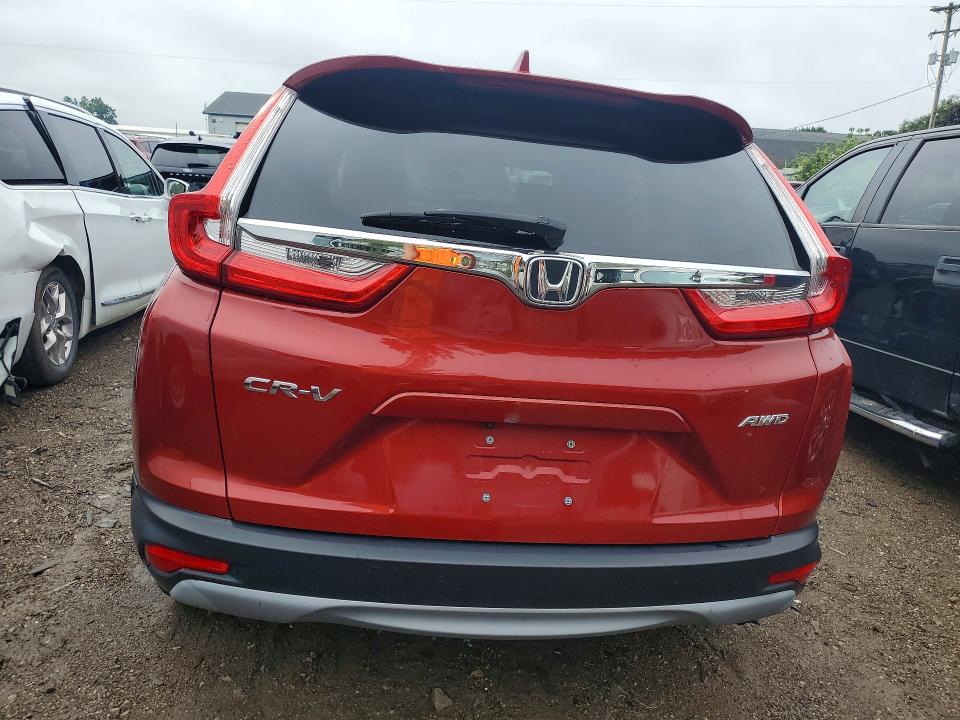 Photo 6 from auction – 2017 HONDA CR-V with VIN 5J6RW2H50HL035112