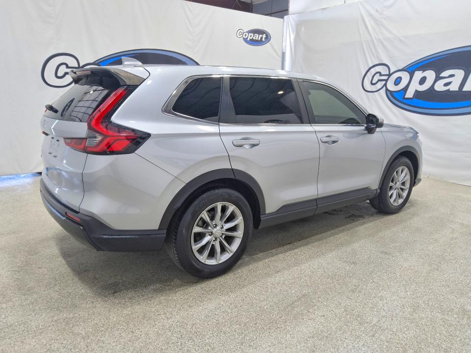 Photo 3 from auction – 2023 HONDA CR-V with VIN 2HKRS3H47PH303588