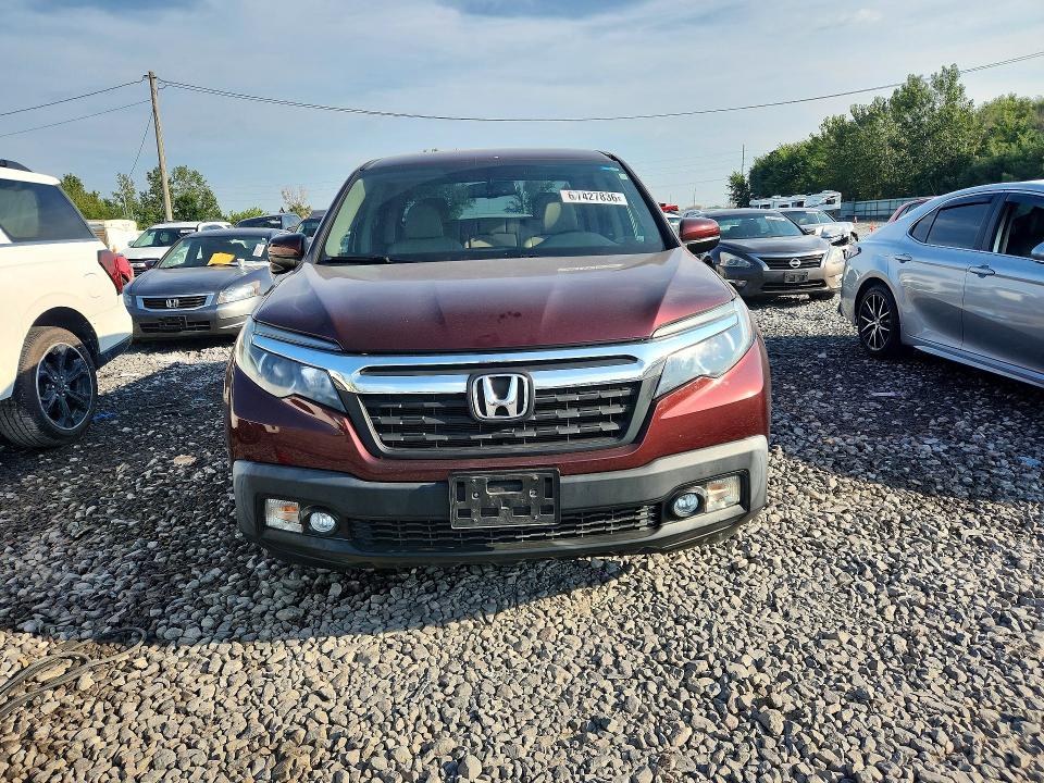 Photo 5 from auction – 2017 HONDA RIDGELINE with VIN 5FPYK3F68HB004327